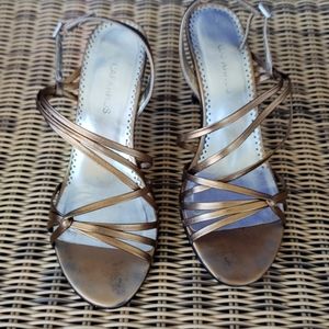 Flattering gold strappy pump